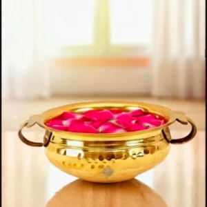 brass urli bowl with floating flowers for festive decor